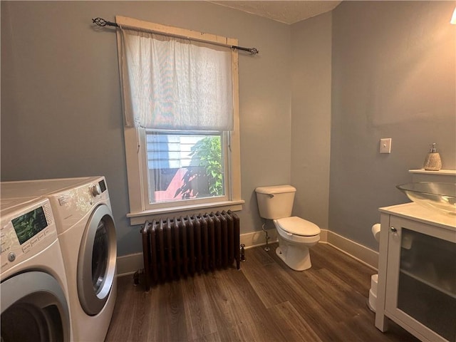 306 Shirls Ave, City Of Washington, PA 15301 - washroom with radiator, washing machine and clothes dryer, dark wood finished floors, and baseboards