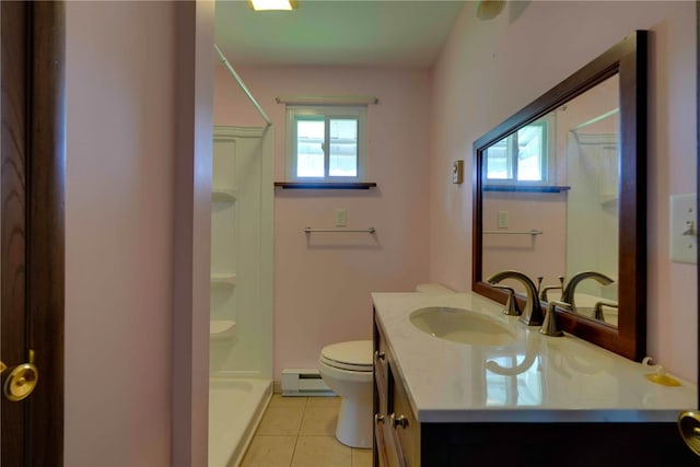 bathroom featuring tile patterned floors, toilet, a shower, vanity, and baseboard heating