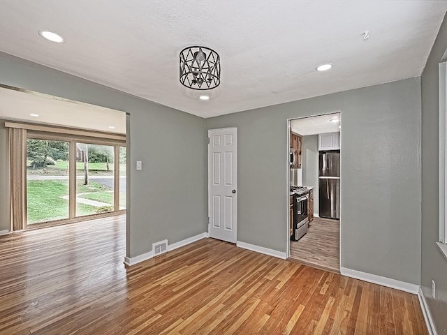 empty room featuring light hardwood / wood-style flooring