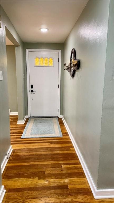 doorway to outside featuring hardwood / wood-style floors