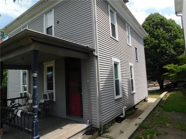 view of home's exterior featuring cooling unit