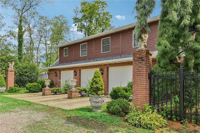 view of front of property featuring a garage