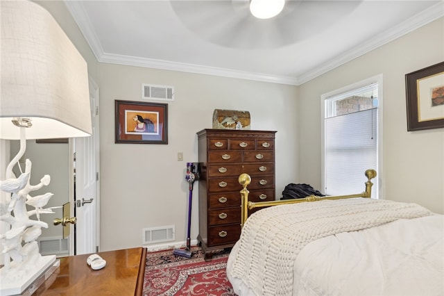 bedroom featuring ceiling fan and crown molding