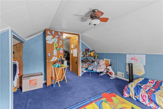 carpeted bedroom featuring ceiling fan and lofted ceiling