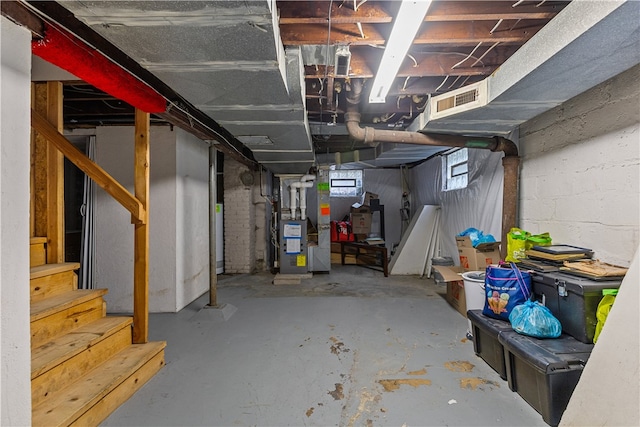 basement featuring heating unit