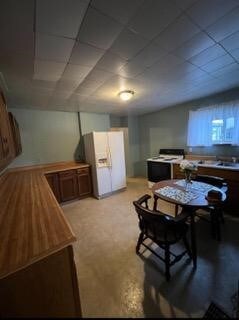 dining room with a paneled ceiling