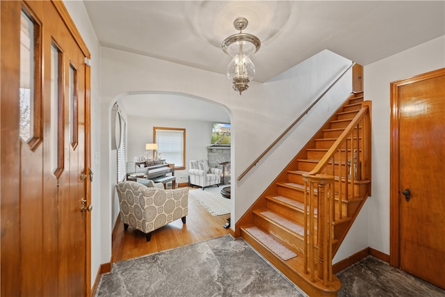 foyer with dark hardwood / wood-style flooring