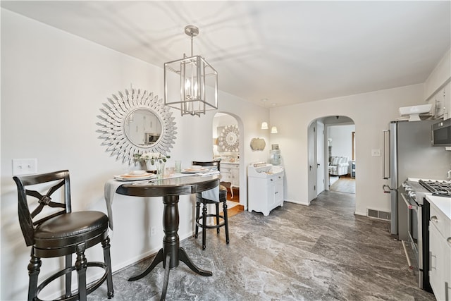 dining room featuring a notable chandelier