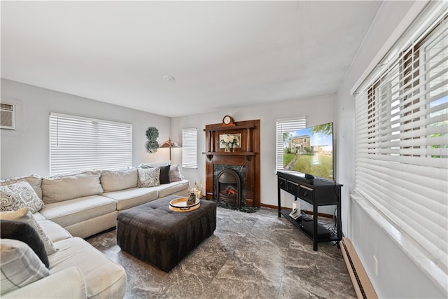 living room featuring baseboard heating and a wall unit AC