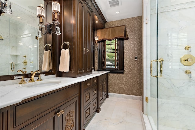 bathroom featuring double vanity, tile patterned floors, and an enclosed shower