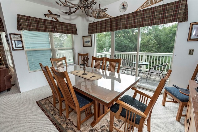 view of carpeted dining space