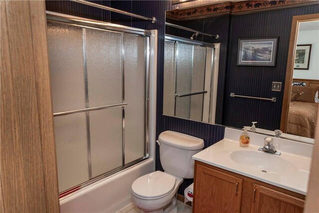 9133 Aspen Dr, Seven Springs Resort, PA 15622 - bathroom featuring vanity, toilet, and bath / shower combo with glass door
