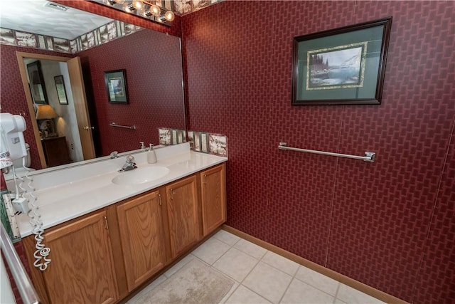 bathroom with vanity and tile patterned floors