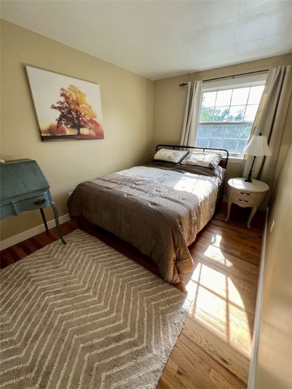 bedroom featuring hardwood / wood-style floors