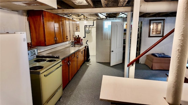 kitchen with sink and white appliances