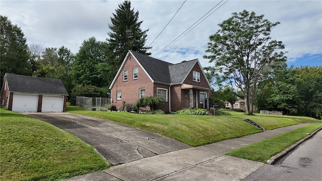 view of front of home with a garage and a front yard