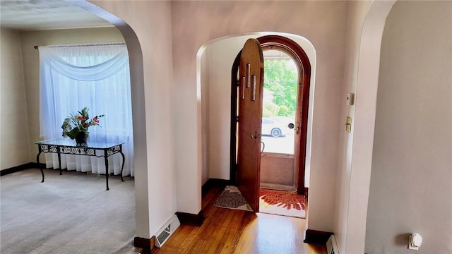 foyer entrance featuring hardwood / wood-style flooring