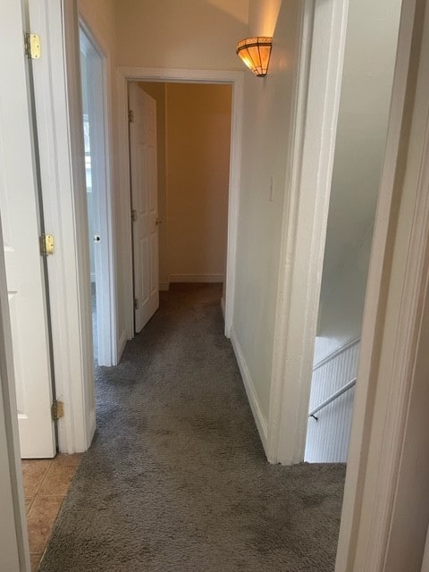 corridor with carpet floors