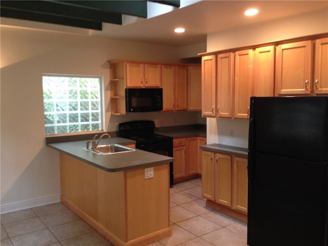 kitchen with light tile patterned floors, kitchen peninsula, black appliances, light brown cabinetry, and sink