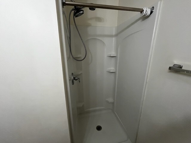 bathroom featuring a shower