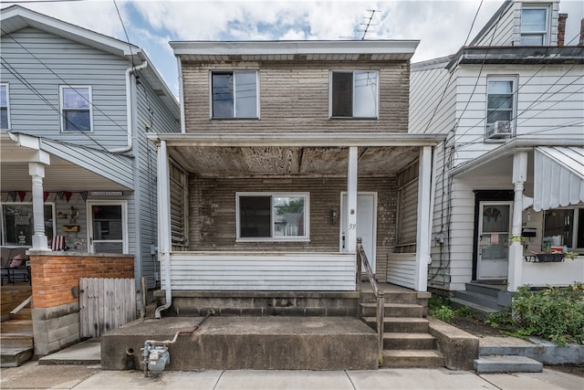 multi unit property featuring covered porch