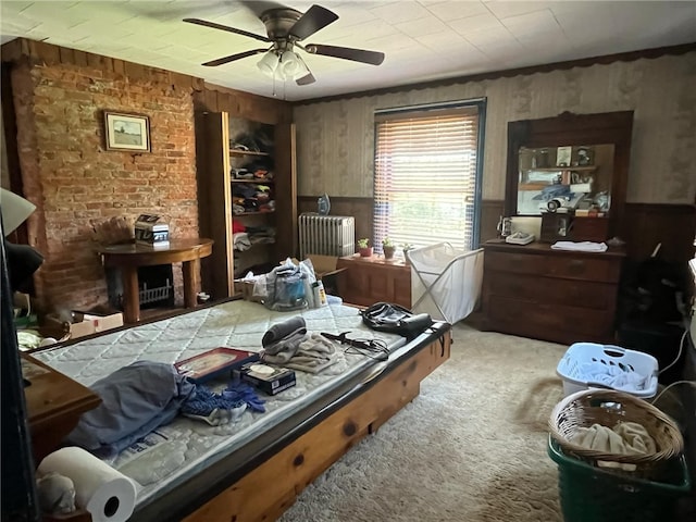 340 Mine Hill Rd, German Twp, PA 15410 - carpeted bedroom with ceiling fan, wood walls, and radiator heating unit