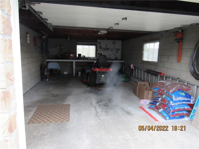 garage with a workshop area