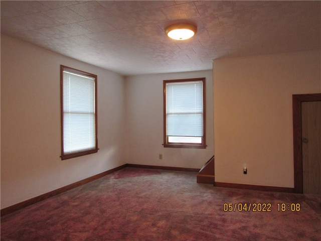 view of carpeted spare room