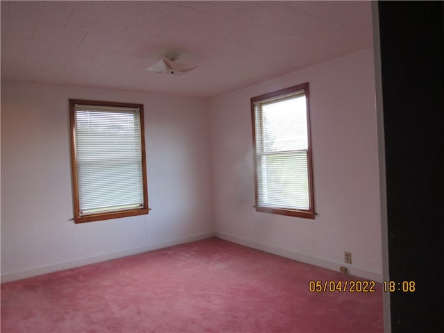 view of carpeted spare room