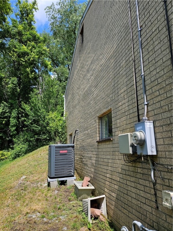 view of home's exterior with central air condition unit