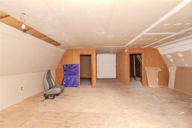 bonus room featuring lofted ceiling