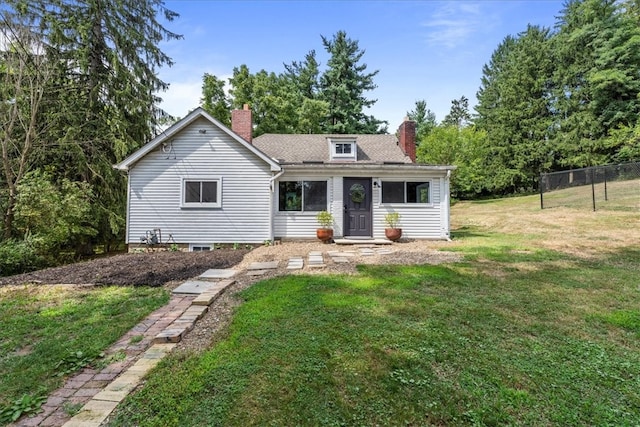 view of front of property with a front lawn