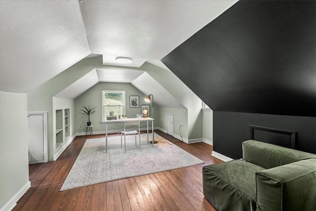 office area with lofted ceiling and dark hardwood / wood-style flooring