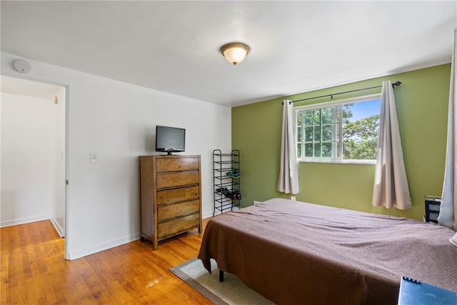 bedroom featuring hardwood / wood-style floors