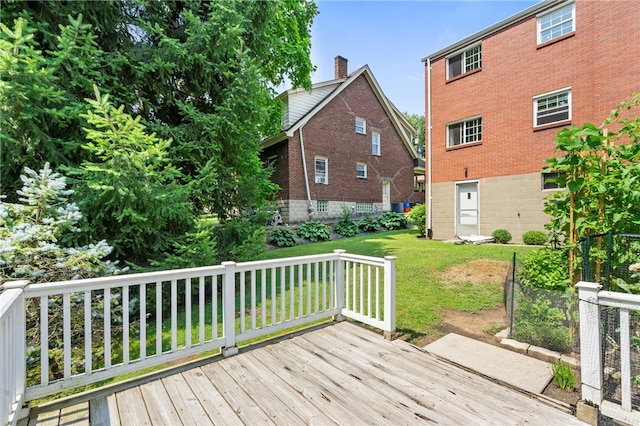 deck featuring a lawn