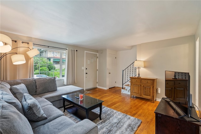 living room with light hardwood / wood-style floors