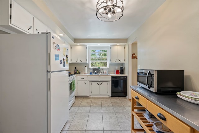 kitchen with white cabinets, sink, white appliances, and light tile patterned floors