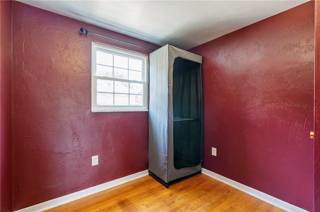 unfurnished room featuring light hardwood / wood-style flooring