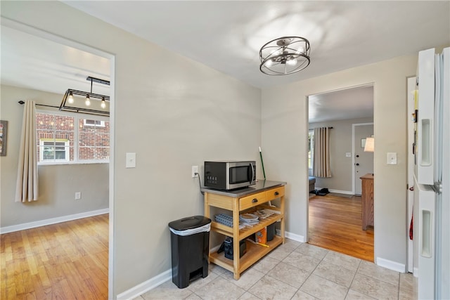 interior space with light tile patterned floors