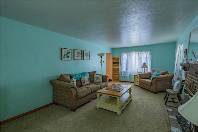 living room with light carpet, a fireplace, and a textured ceiling