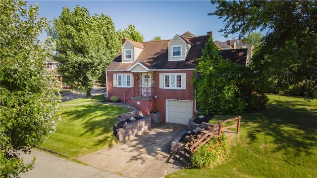 cape cod-style house featuring a garage and a front yard