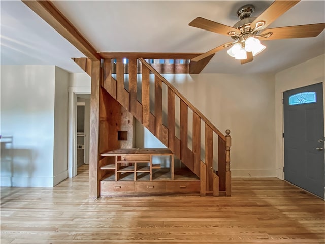 entrance foyer with light hardwood / wood-style flooring and ceiling fan