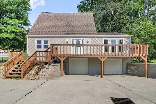 exterior space featuring a deck and a garage