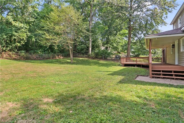 view of yard with a deck