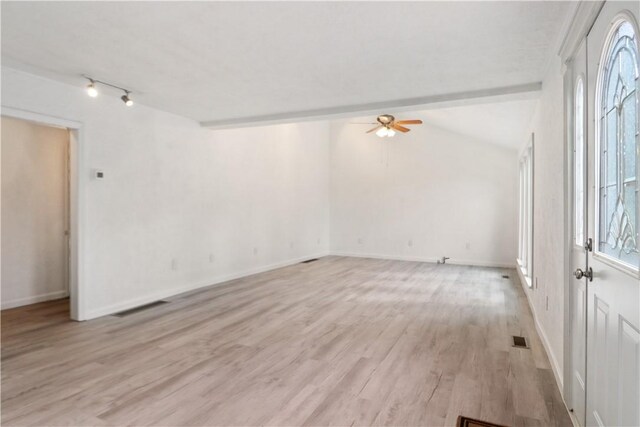 unfurnished room with ceiling fan, light wood-type flooring, and track lighting