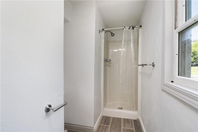 bathroom featuring a shower with curtain