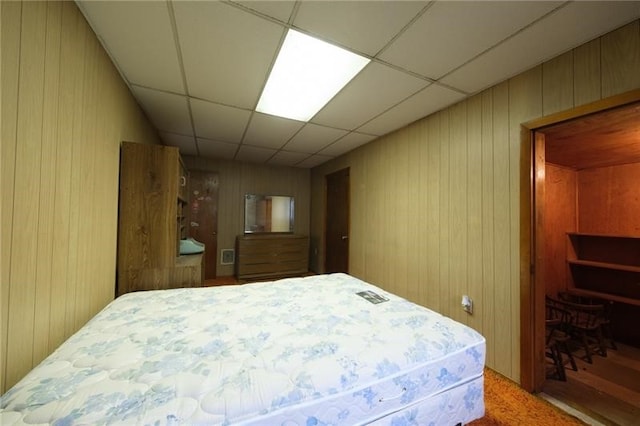 bedroom featuring a drop ceiling