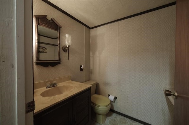 bathroom featuring vanity, toilet, tile patterned floors, and a textured ceiling