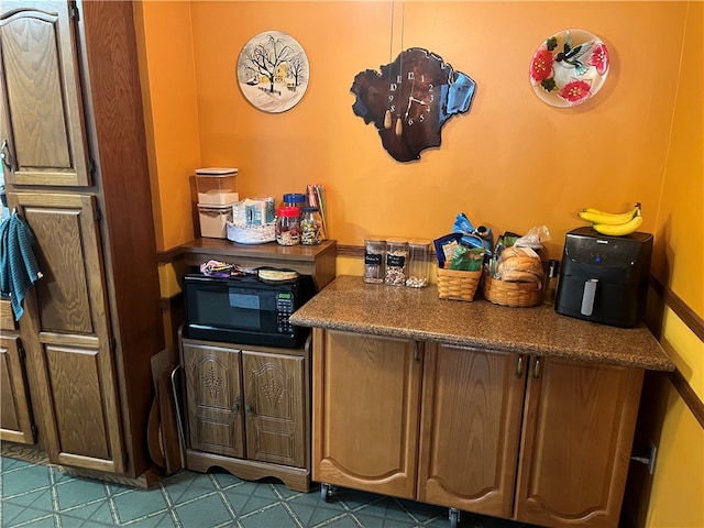 kitchen featuring tile patterned flooring