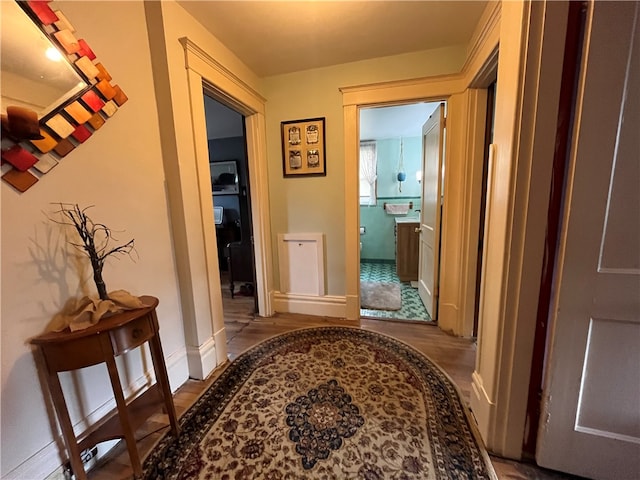 hallway with tile patterned floors